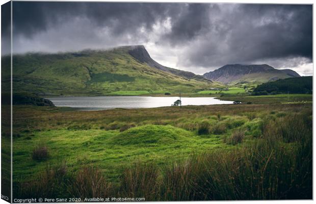 Dramatic Cloudy landscape in Snowdonia, Wales Canvas Print by Pere Sanz