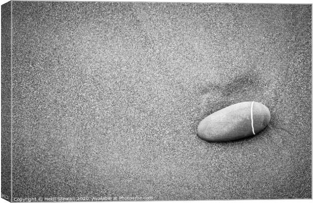 Pebble On The Beach Canvas Print by Heidi Stewart