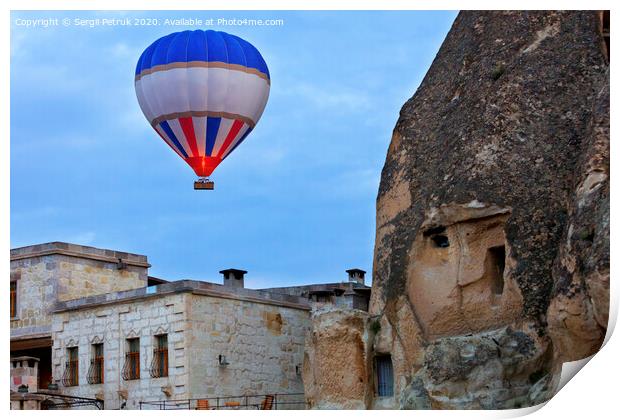 Balloon flying over the old town of Cappadocia Print by Sergii Petruk