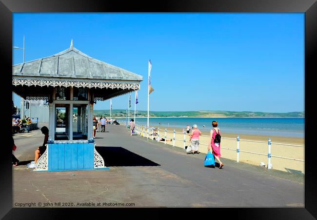Victorian seaside shelter and beach at Weymouth in Dorset.  Framed Print by john hill