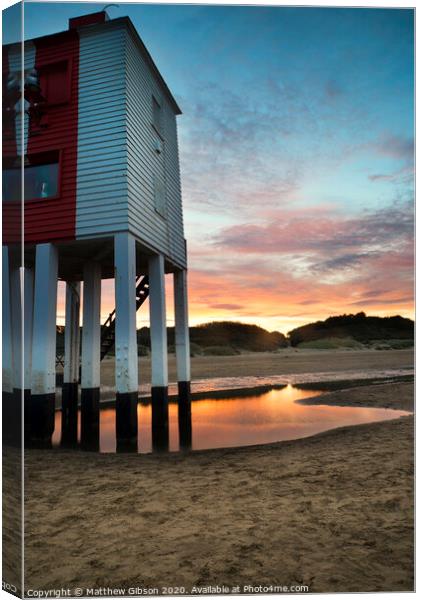 Beautiful landscape sunrise stilt lighthouse on beach Canvas Print by Matthew Gibson