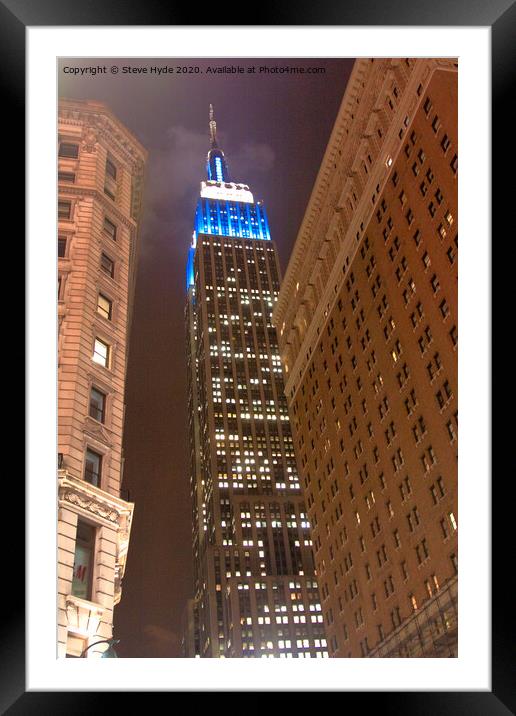 The Empire State Building, New York City illuminated at night Framed Mounted Print by Steve Hyde