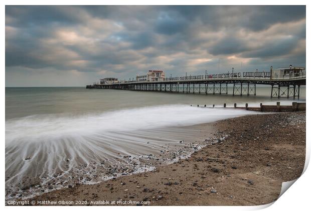 Beautiful long exposure sunset landscape image of pier at sea in Worthing England Print by Matthew Gibson