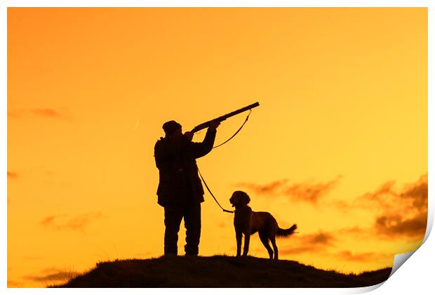 Hunter with Dog at Sunset Print by Arterra 