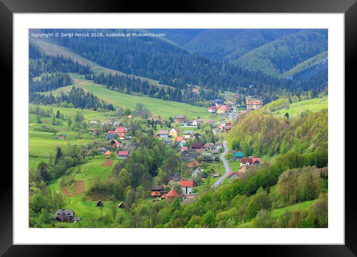View of the winding road passing through the Carpathian village Framed Mounted Print by Sergii Petruk