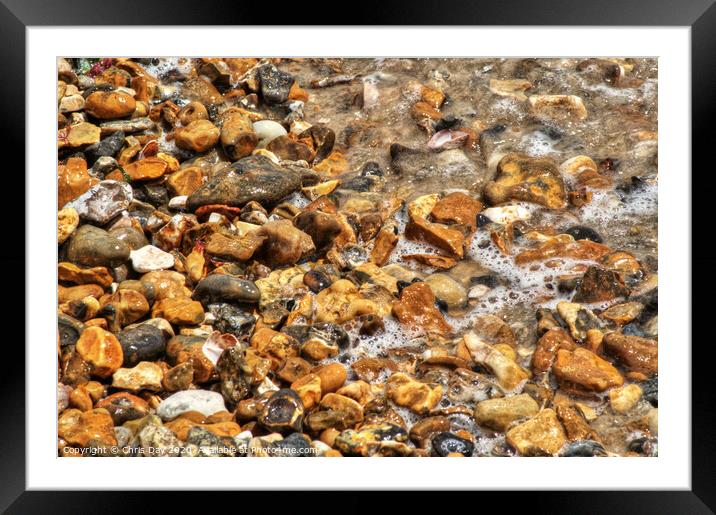Pebbles and stones on the beach Framed Mounted Print by Chris Day