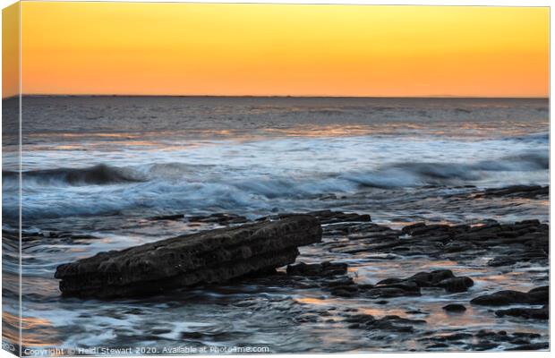 A Glowing Sunset Canvas Print by Heidi Stewart