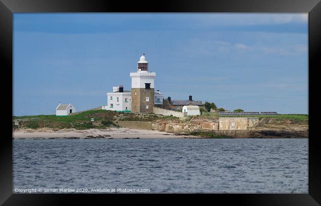 The lighthouse on Amble Island, Northumberland Framed Print by Simon Marlow