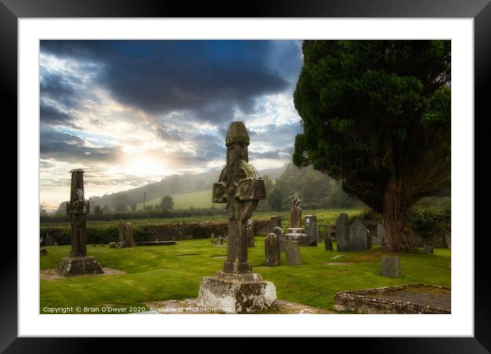 celtic cross sunset Framed Mounted Print by Brian O'Dwyer