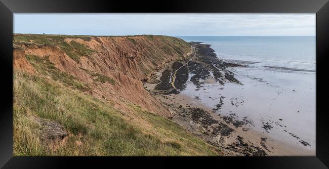 Filey Brigg cliffs and rock pools Framed Print by Jason Wells