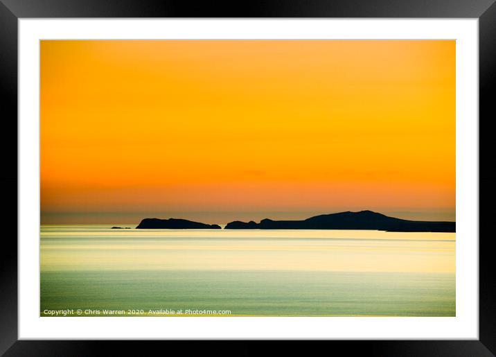 Orange glow over St Brides Bay Framed Mounted Print by Chris Warren