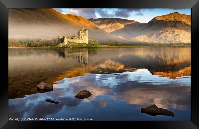 Kilchurn Castle at dawn reflected in Lock Awe Framed Print by Chris Drabble
