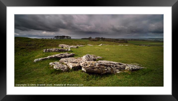A storm brewing over Arbor Low Framed Mounted Print by Chris Drabble