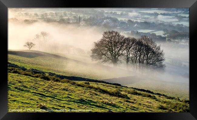 Bamford village shrouded in a mist inversion Framed Print by Chris Drabble