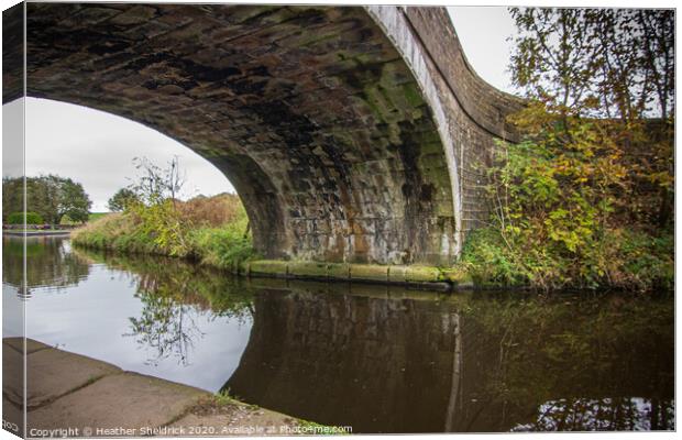 Canal Bridge on Leeds and Liverpool Canal Canvas Print by Heather Sheldrick