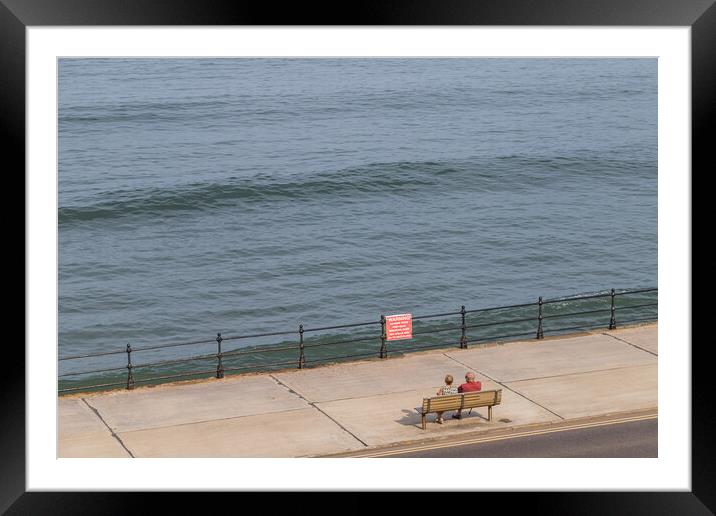 Looking down on a couple on the Scarborough promenade Framed Mounted Print by Jason Wells