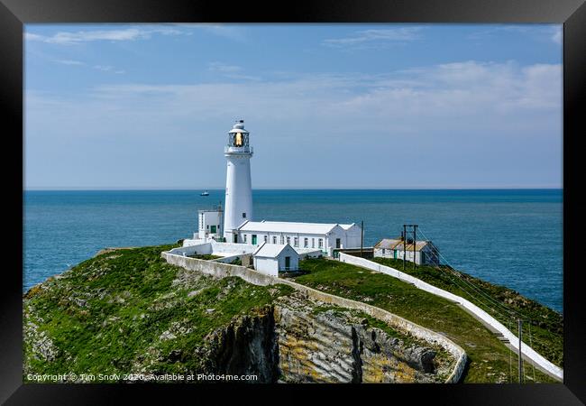 South Stack lighthouse at Holyhead on Anglesey Framed Print by Tim Snow