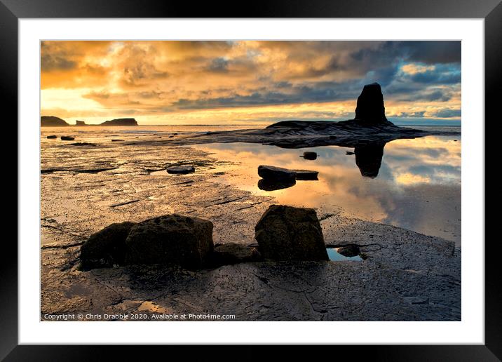 Black Nab at sunset. Saltwick Bay Framed Mounted Print by Chris Drabble
