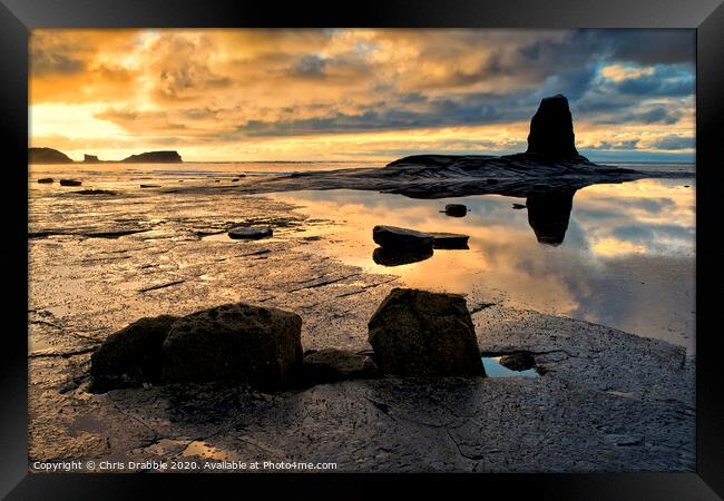 Black Nab at sunset. Saltwick Bay Framed Print by Chris Drabble