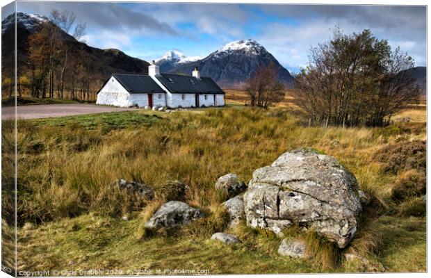 Blackrock Cottage with Buachaille Etive Mor in the Canvas Print by Chris Drabble