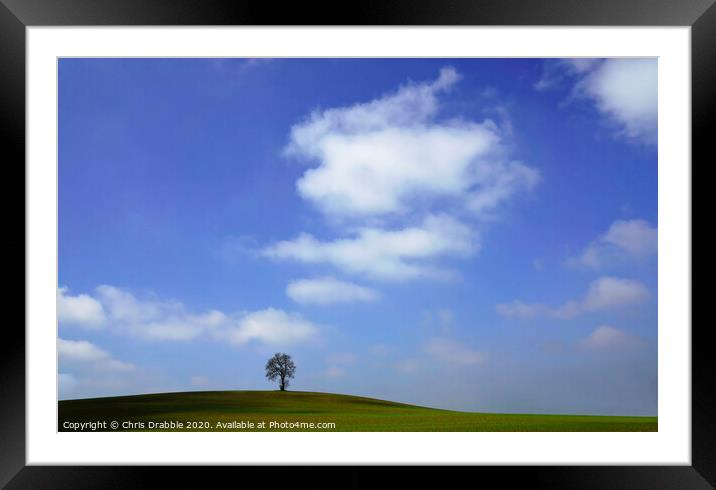Blue skies over One Tree Hill Framed Mounted Print by Chris Drabble