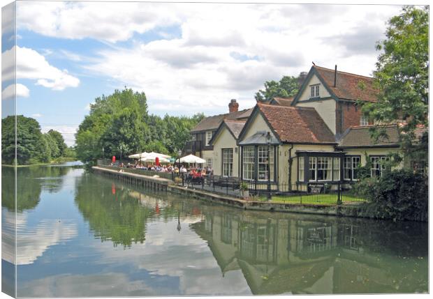 Pub on the river Lea at Dobbs Weir, Roydon, Essex Canvas Print by Laurence Tobin