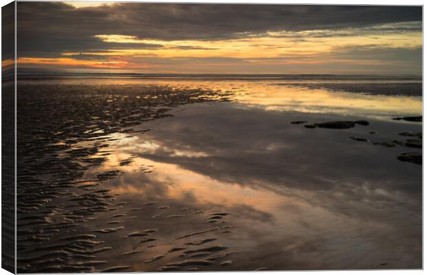 Moody sunset reflections Canvas Print by Tony Twyman