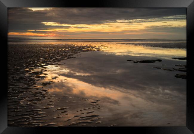 Moody sunset reflections Framed Print by Tony Twyman