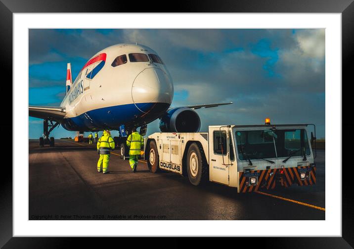 787 dreamliner and tow team Framed Mounted Print by Peter Thomas