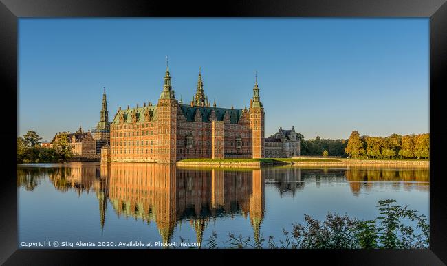 The Royal Frederiksborg Castle in a mirror-gloss reflection at surise  Framed Print by Stig Alenäs