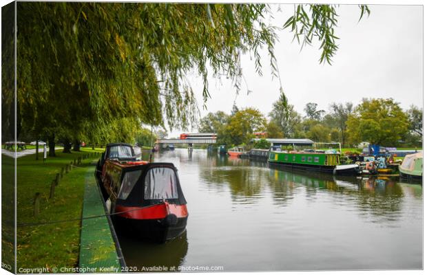 Ely Riverside Canvas Print by Christopher Keeley