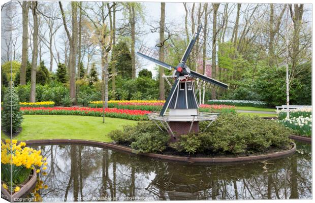 windmill and tulips in dutch Keukenhof Canvas Print by Chris Willemsen