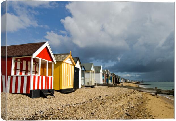 Beach huts at Thorpe Bay, Essex, UK Canvas Print by Peter Bolton