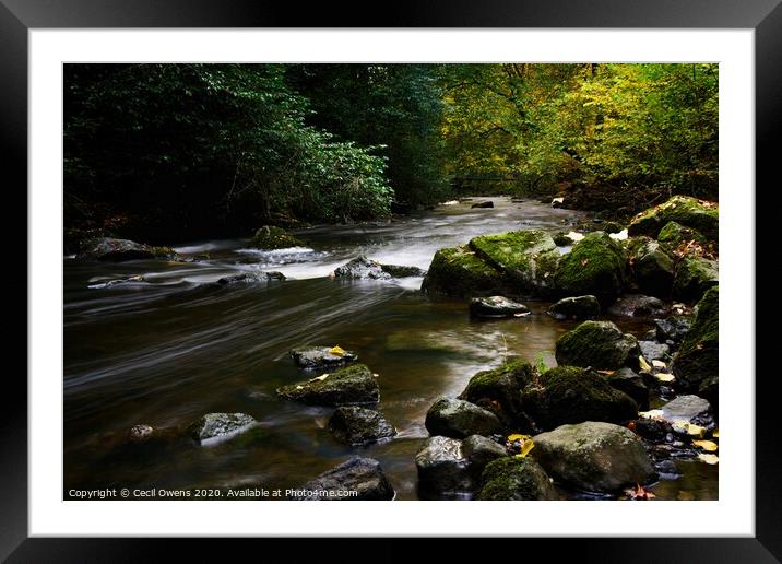 Fast flowing river Framed Mounted Print by Cecil Owens