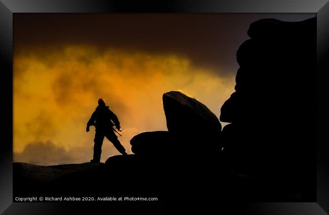 Mountain walker at sunset Framed Print by Richard Ashbee