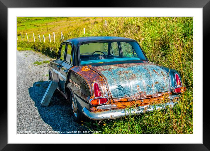 An old vintage car rusting in a Shetland farm Framed Mounted Print by Richard Ashbee