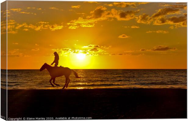 Horseback Riding at Sunset Canvas Print by Elaine Manley