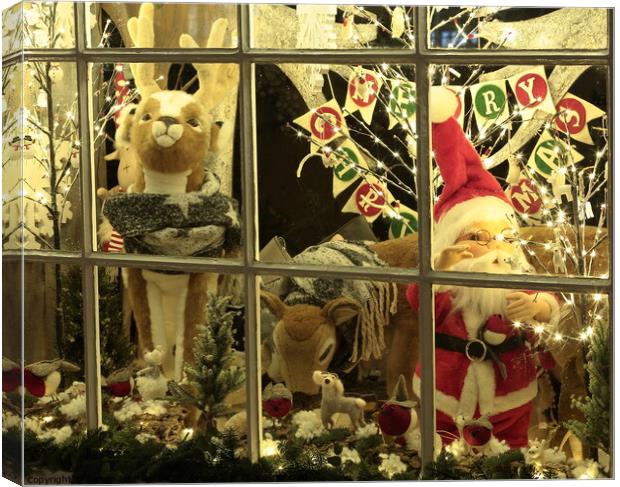 Christmas shop window Canvas Print by Simon Johnson