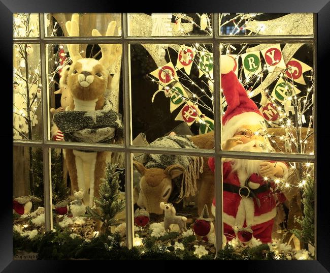 Christmas shop window Framed Print by Simon Johnson