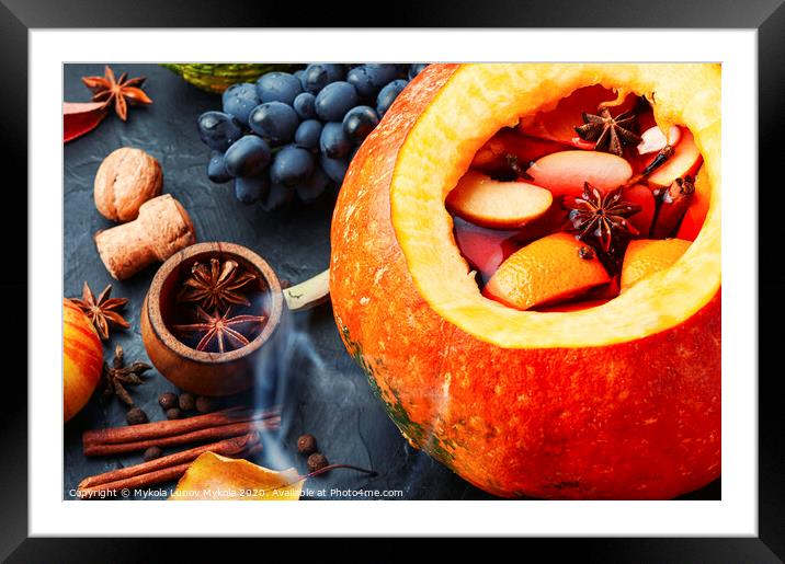 Mulled wine in pumpkin Framed Mounted Print by Mykola Lunov Mykola