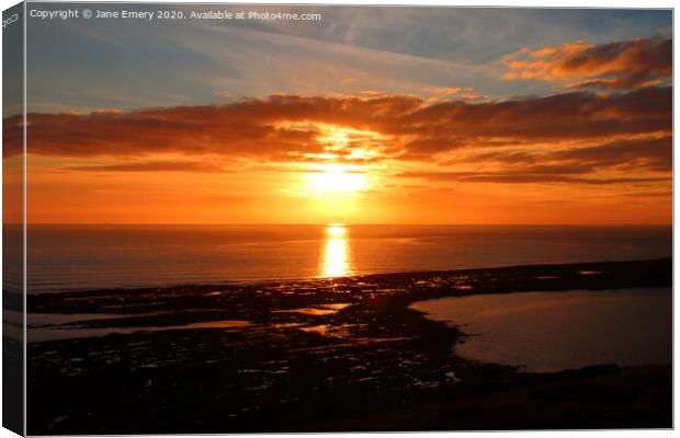 Sky, setting  sun, overlooking the causeway at Rhossilli Canvas Print by Jane Emery
