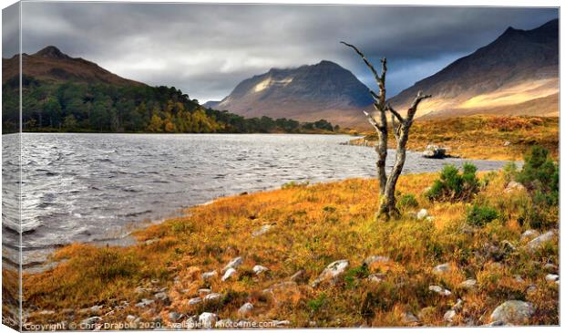 Breaking light over Loch Clair Canvas Print by Chris Drabble