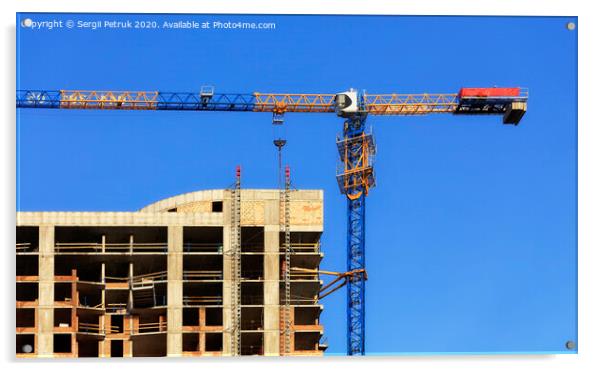 Facade and construction crane near the modern concrete building under construction. Acrylic by Sergii Petruk