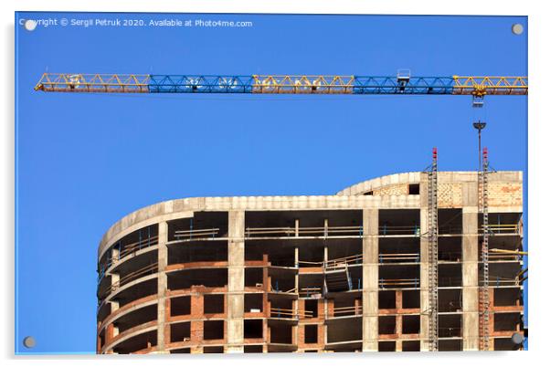Facade and construction crane near the modern concrete building under construction. Acrylic by Sergii Petruk