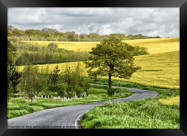 Winding country road at The Hanningfields, Essex, UK Framed Print by Peter Bolton
