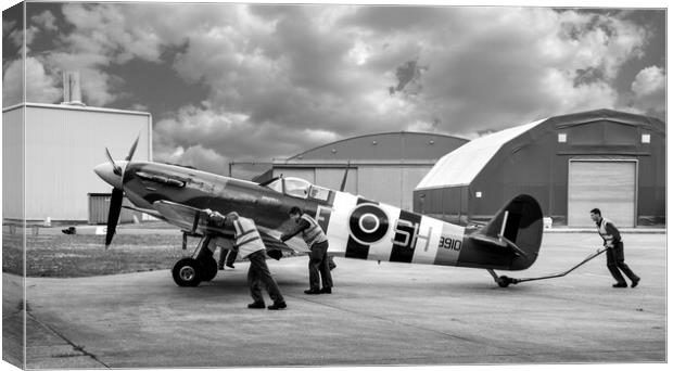 Spitfire ready to roll Canvas Print by Mike Bell