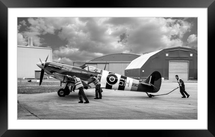 Spitfire ready to roll Framed Mounted Print by Mike Bell