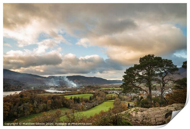 Majestic Autumn Fall landscape image of view from Castlehead in Lake District over Derwentwater towards Catbells and Grisedale Pike at sunset with epic lighting in sky Print by Matthew Gibson