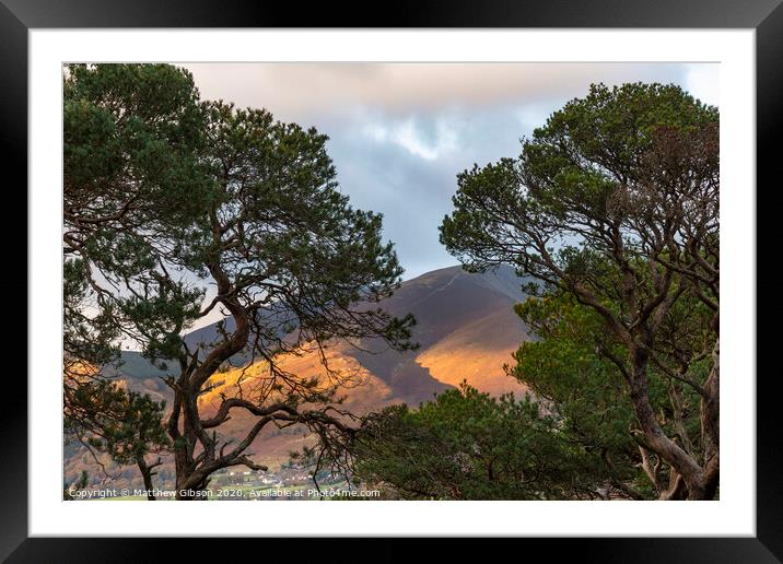 Majestic Autumn Fall landscape image of view from Castlehead in Lake District towards Skiddaw at sunset with beautiful lighting in sky Framed Mounted Print by Matthew Gibson