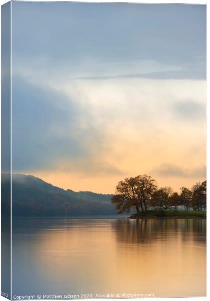 Stuning Autumn Fall sunrise landscape over Coniston Water with mist and wispy clouds Canvas Print by Matthew Gibson